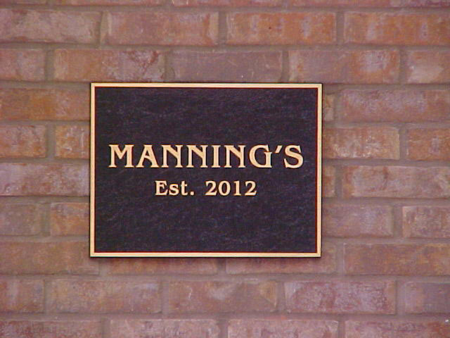 Bronze plaque for Manning’s restaurant in New Orleans Louisiana